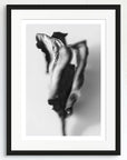 Black and white art print of a flower, titled ‘Rose Mallow’, presented in a black frame.